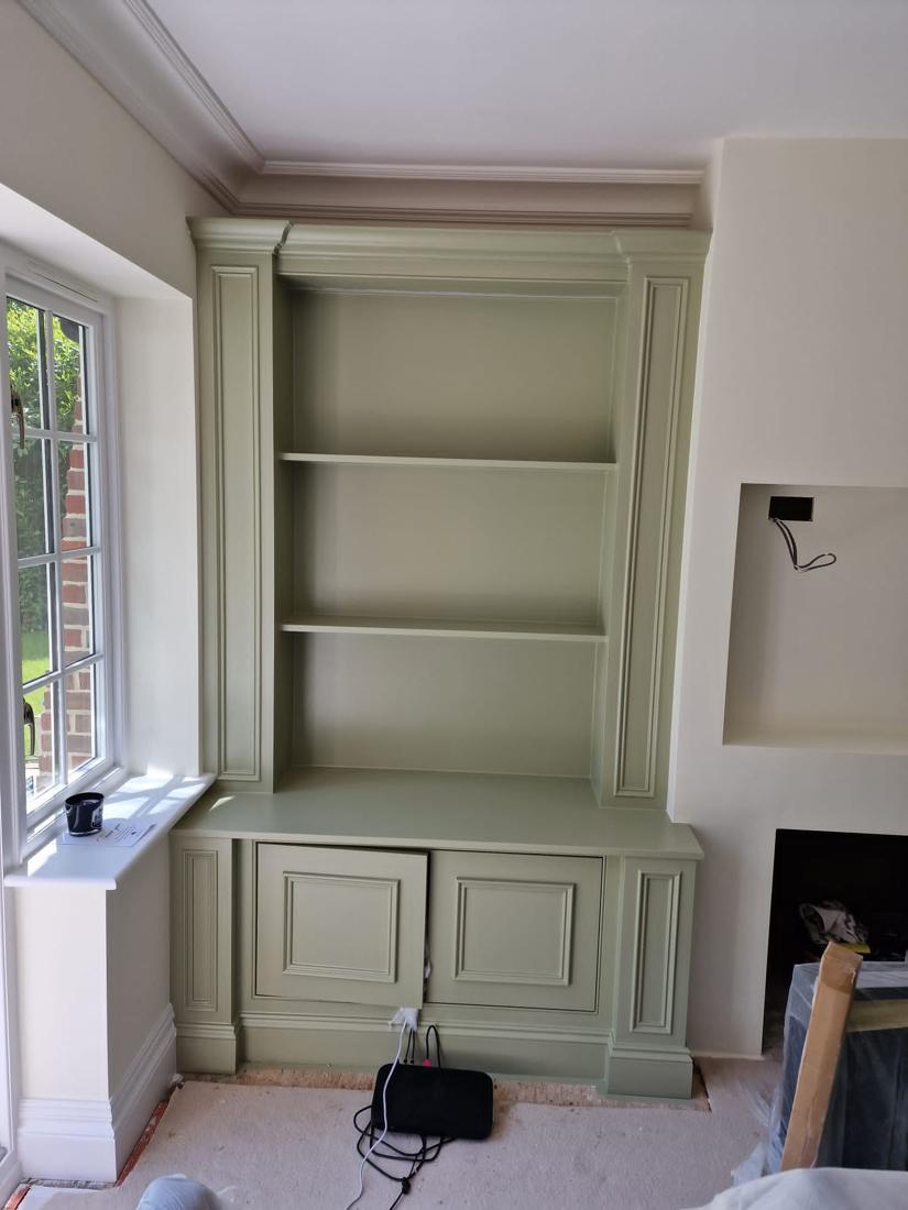 Sage green alcove units